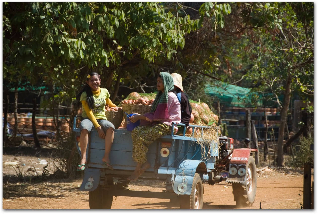 Women on cart in Kompong Chhnang