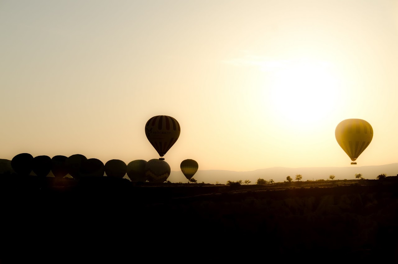 Hot air balloons at sunrise in Cappadocia