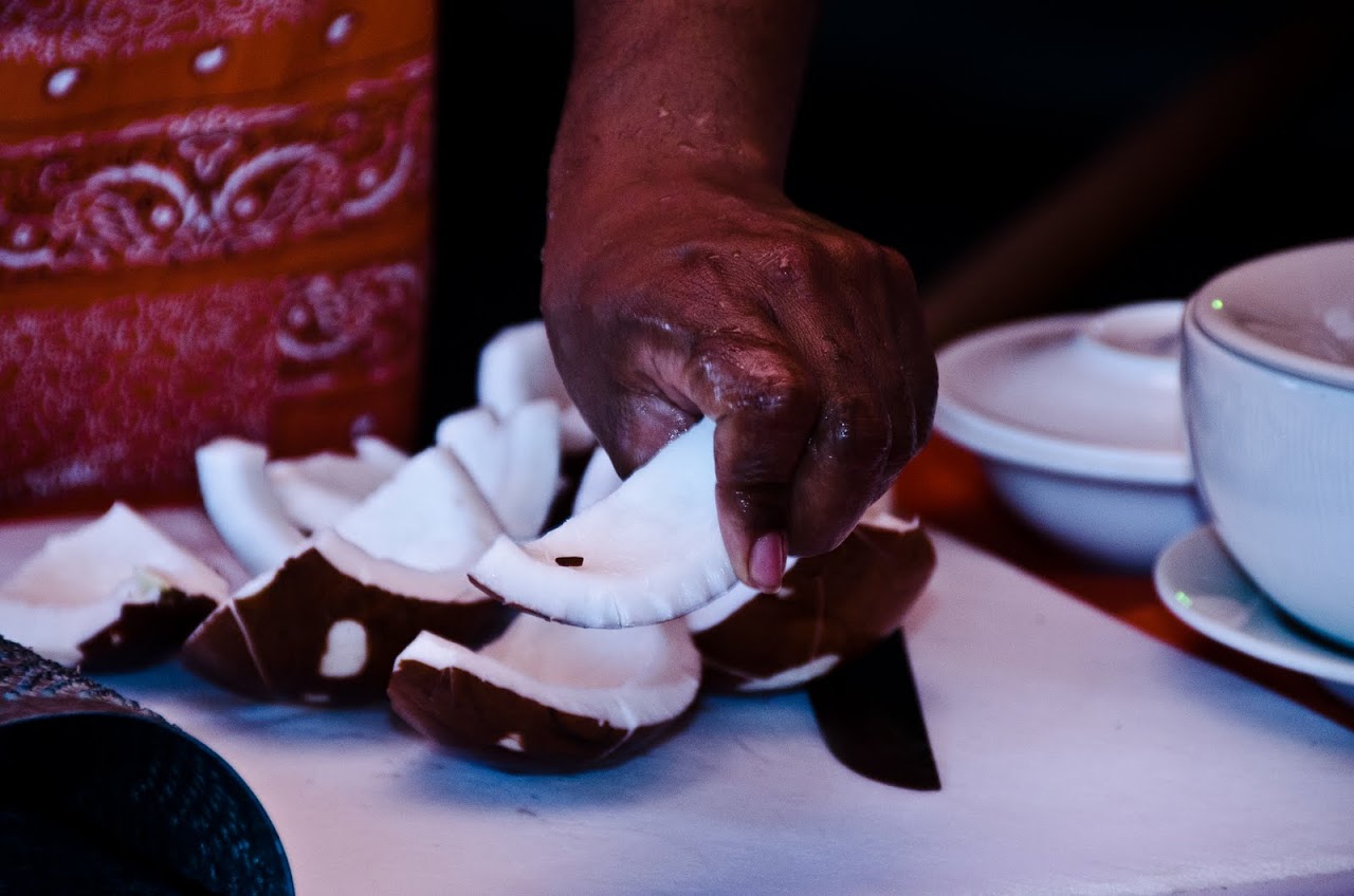 Chopping coconut