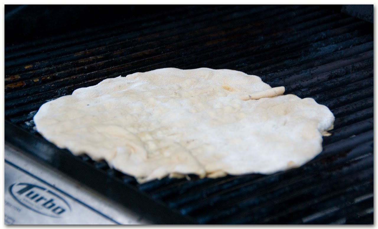 Uncooked crust on grill
