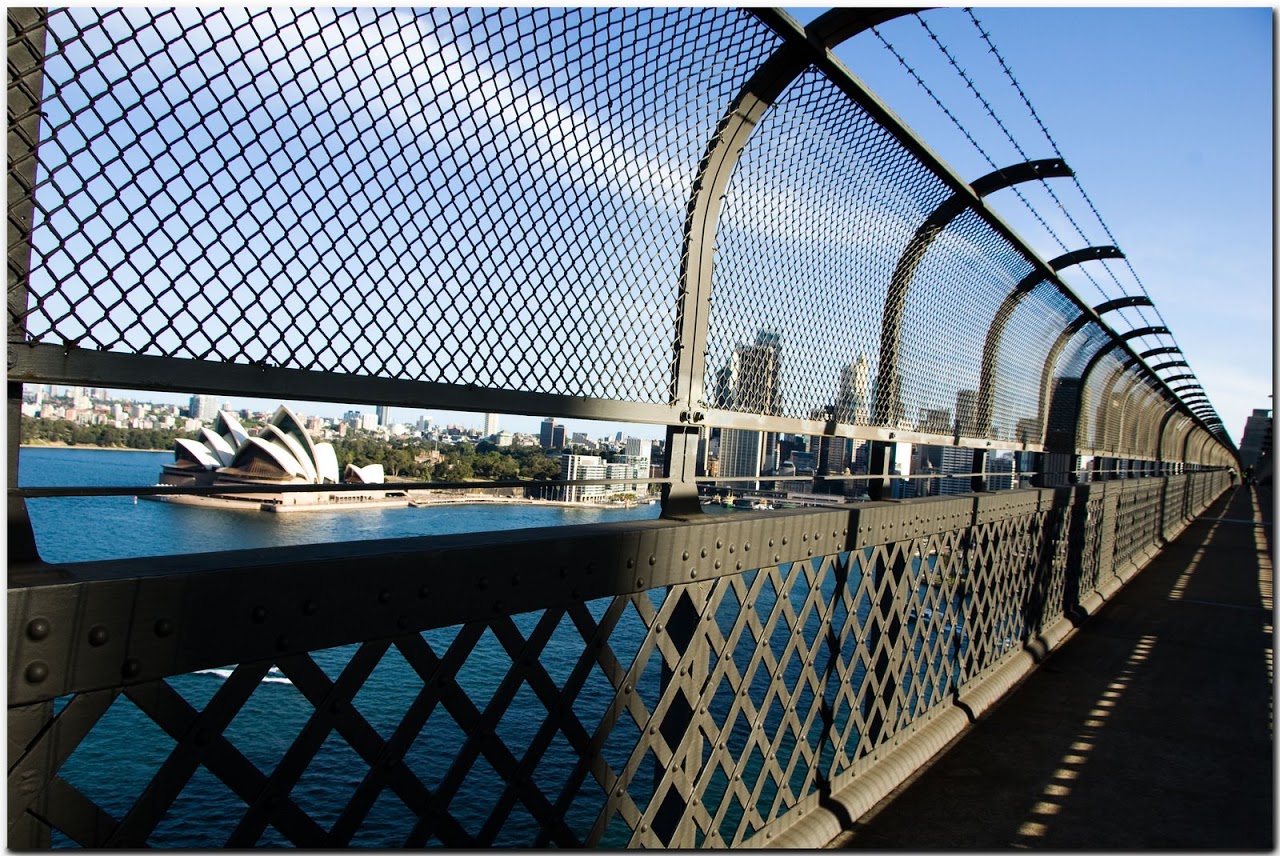 Sydney Opera House through grates in Harbour Bridge