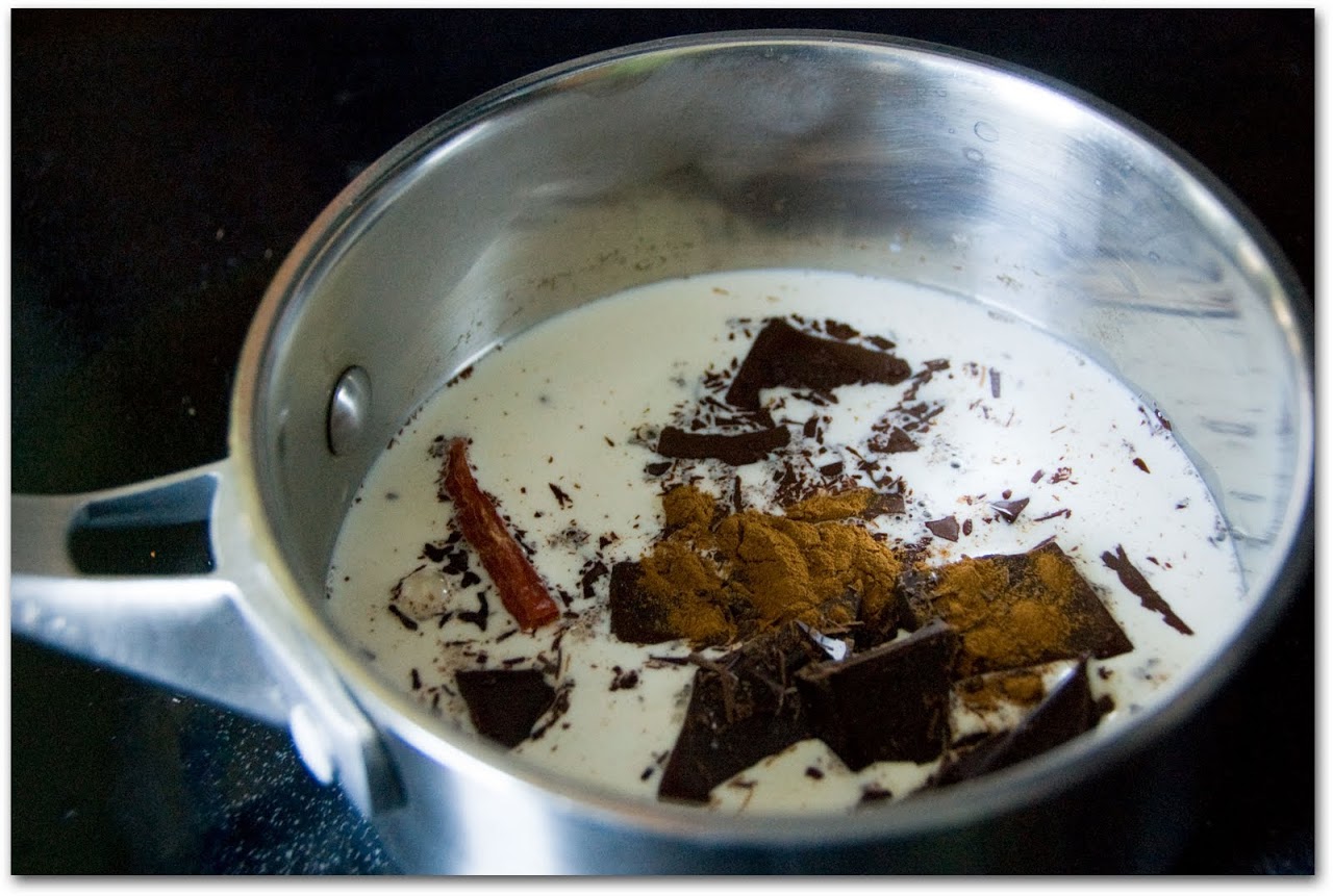 Chocolate simmering with cinnamon and chilies